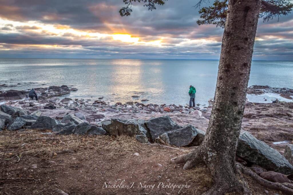 On Lake Superior writer Corey S. looking for his next location for a sunrise photo on the north shore -- Photo courtesy Nicholas J. Narog