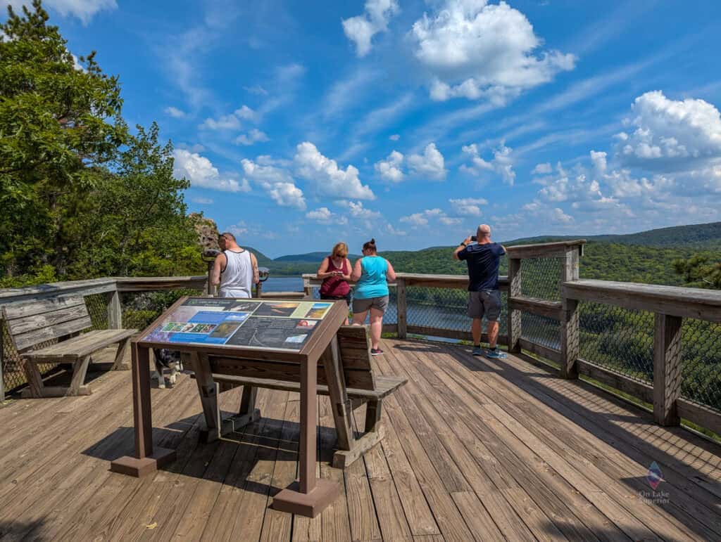 Visitors enjoying the overlook at Lake of the Clouds in the Porcupine Mountains Wilderness
